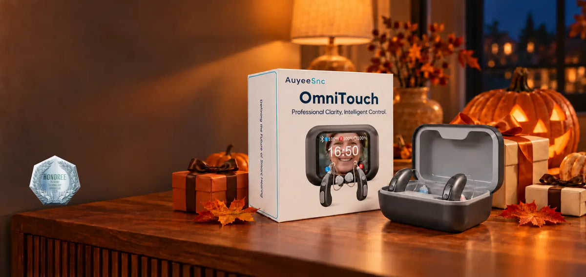 AuyeeSnc OmniTouch hearing aids with Halloween gifts and a 2026 Hearing Technology Innovator honoree badge.
